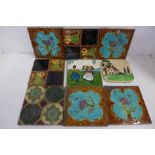 A collection of seven Victorian and later fireplace tiles and one other tile