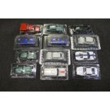 Twelve model vehicles, in bubble packs