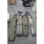 Four vintage golf bags and clubs