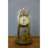 A German Gustav Becker brass anniversary clock