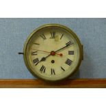 A circular brass ships clock