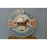 A painted wooden Starlight Carousel fairground sign