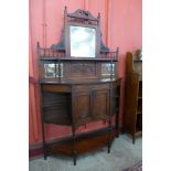 A Victorian Aesthetic Movement walnut mirrorback side cabinet