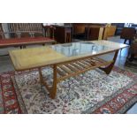 A G-Plan Astro teak and glass topped coffee table