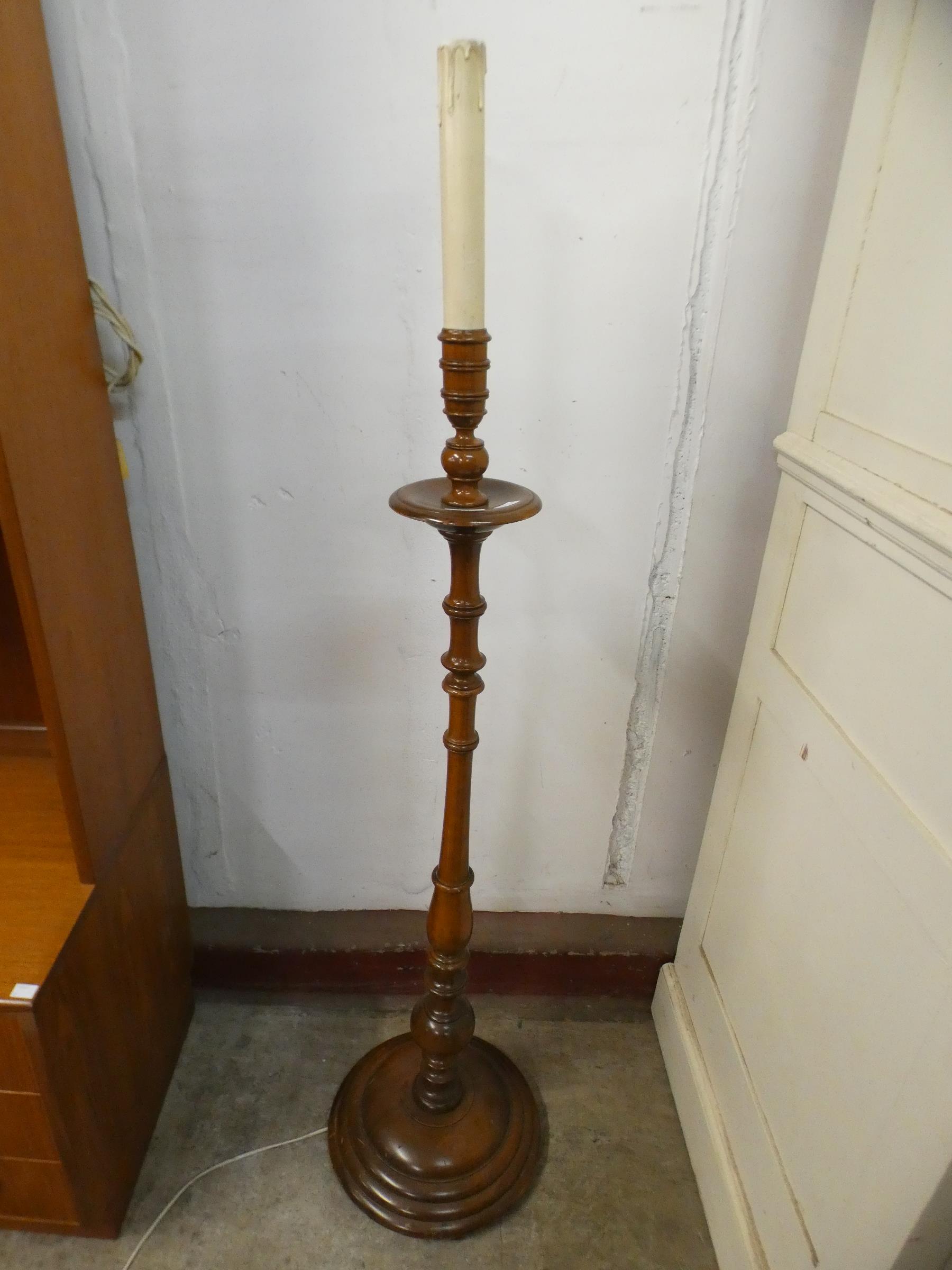 A mahogany standard lamp