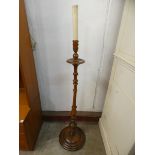 A mahogany standard lamp
