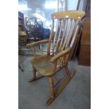 A Victorian elm and beech farmhouse rocking chair