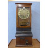 An oak cased Blick oak time recorder