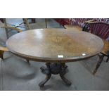 A small Victorian inlaid walnut oval loo table