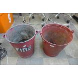 Two red metal fire buckets