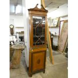 An Edward VII inlaid mahogany freestanding corner cabinet