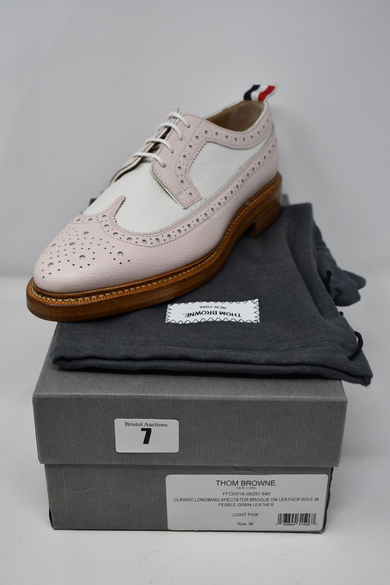 One as new Thom Browne Longwing Spectator Brogue shoes in light pink (EU size 38).