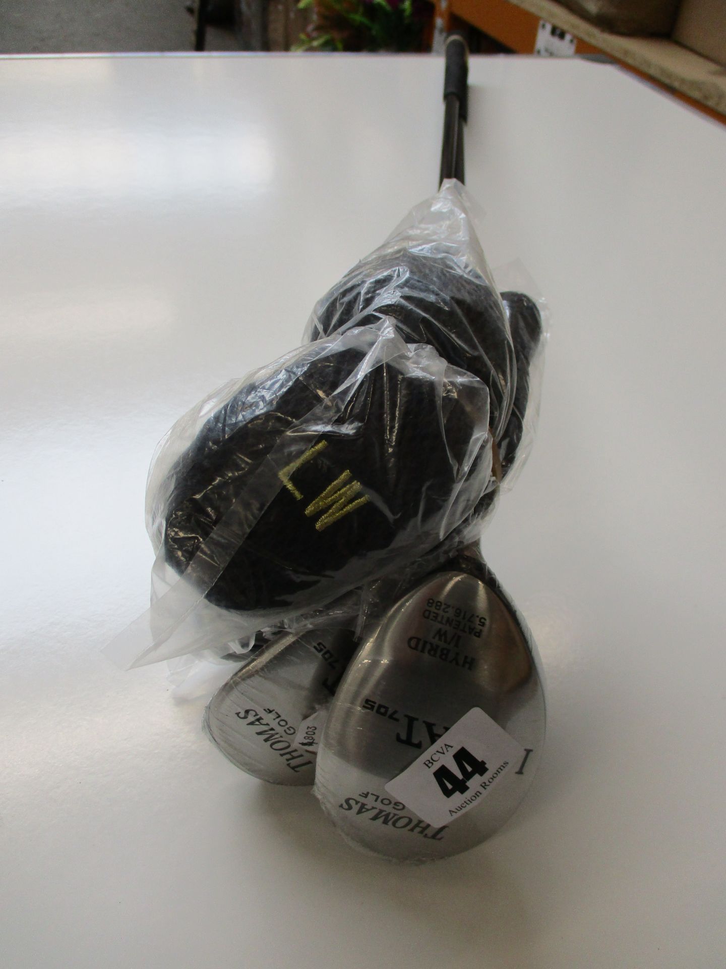 Two as new Thomas Golf AT705 Hybrid golf clubs (G 50 and L60, both right handed) and two boxed as