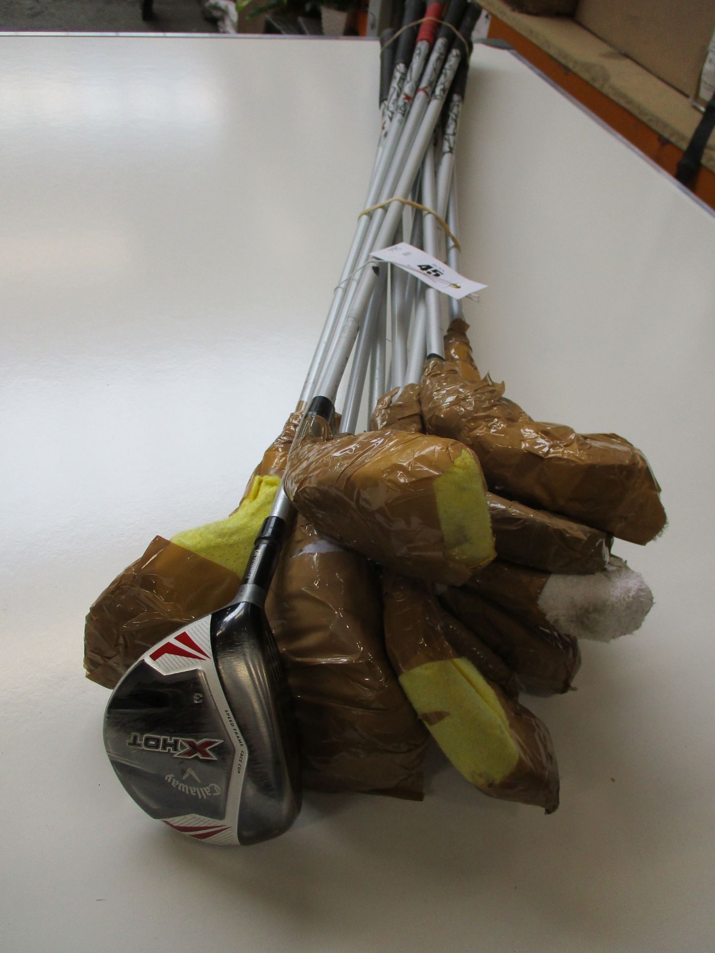 A collection of thirteen pre-owned Callaway X-Hot golf clubs (Left handed).