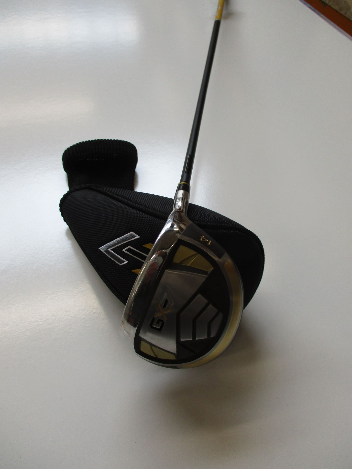 An as new Gx-7 Driver fourteen degree driver golf club.