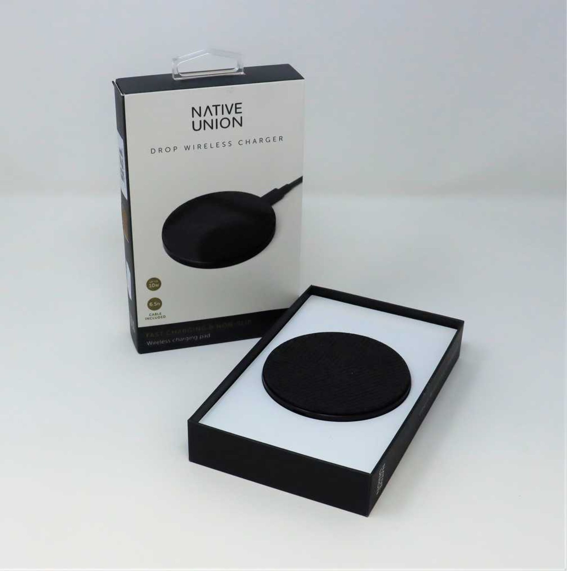 A boxed pre-owned Native Union Drop Wireless Charger for Qi enabled devices.