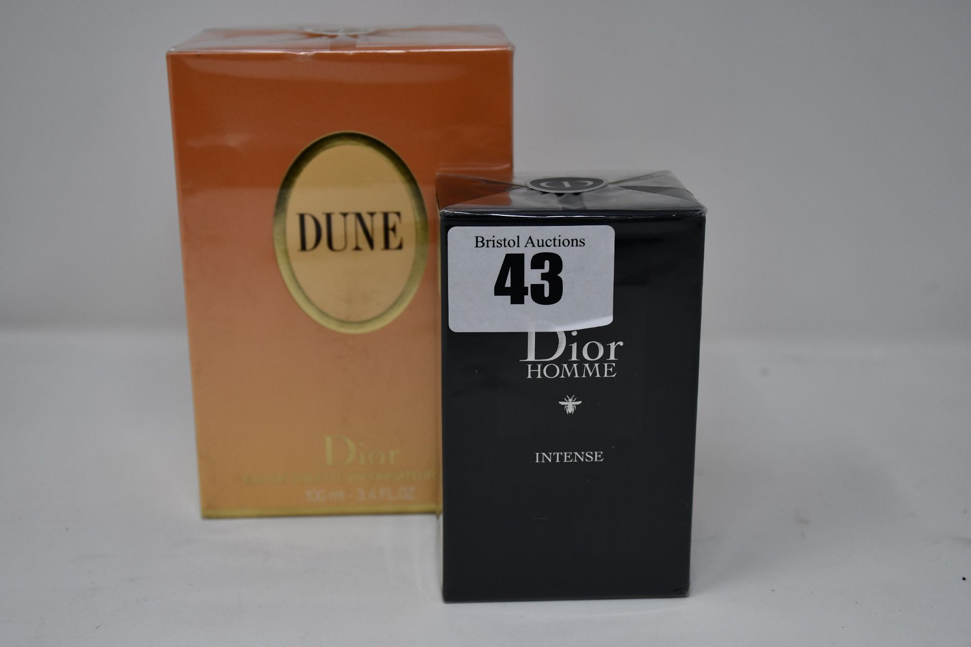 A Dior Homme Intense eau de parfum (50ml) and a Dior Dune eau de toilette (100ml).