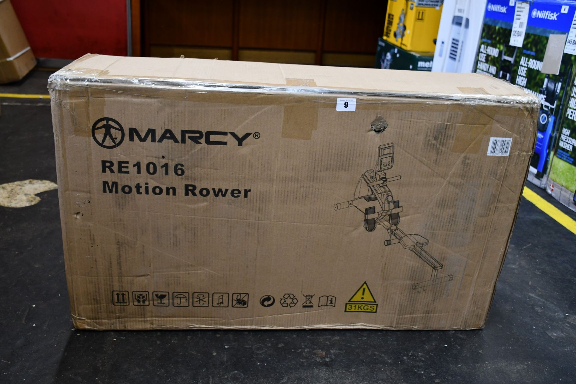 A boxed as new Marcy motion rower (RE1016).