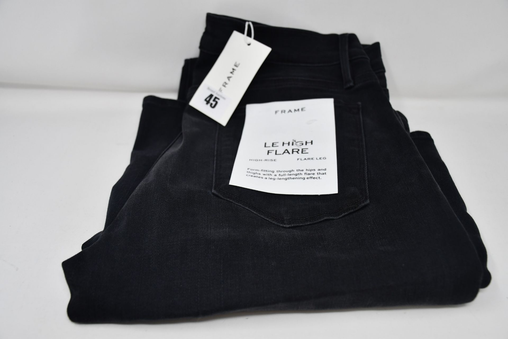 A pair of as new Frame Le High Flare jeans in condor (Size 30).