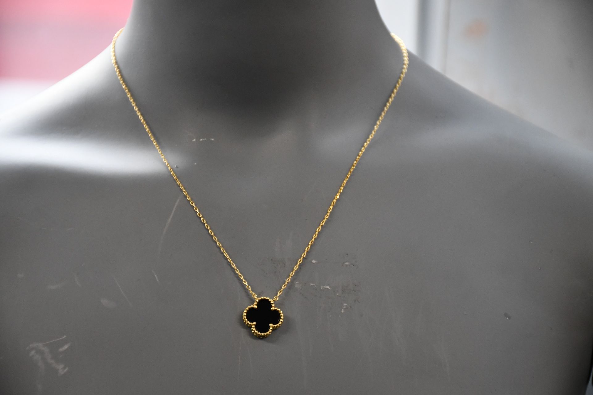 One boxed as new Van Cleef & Arpels Vintage Alhambra Gold and Onyx Pendant.