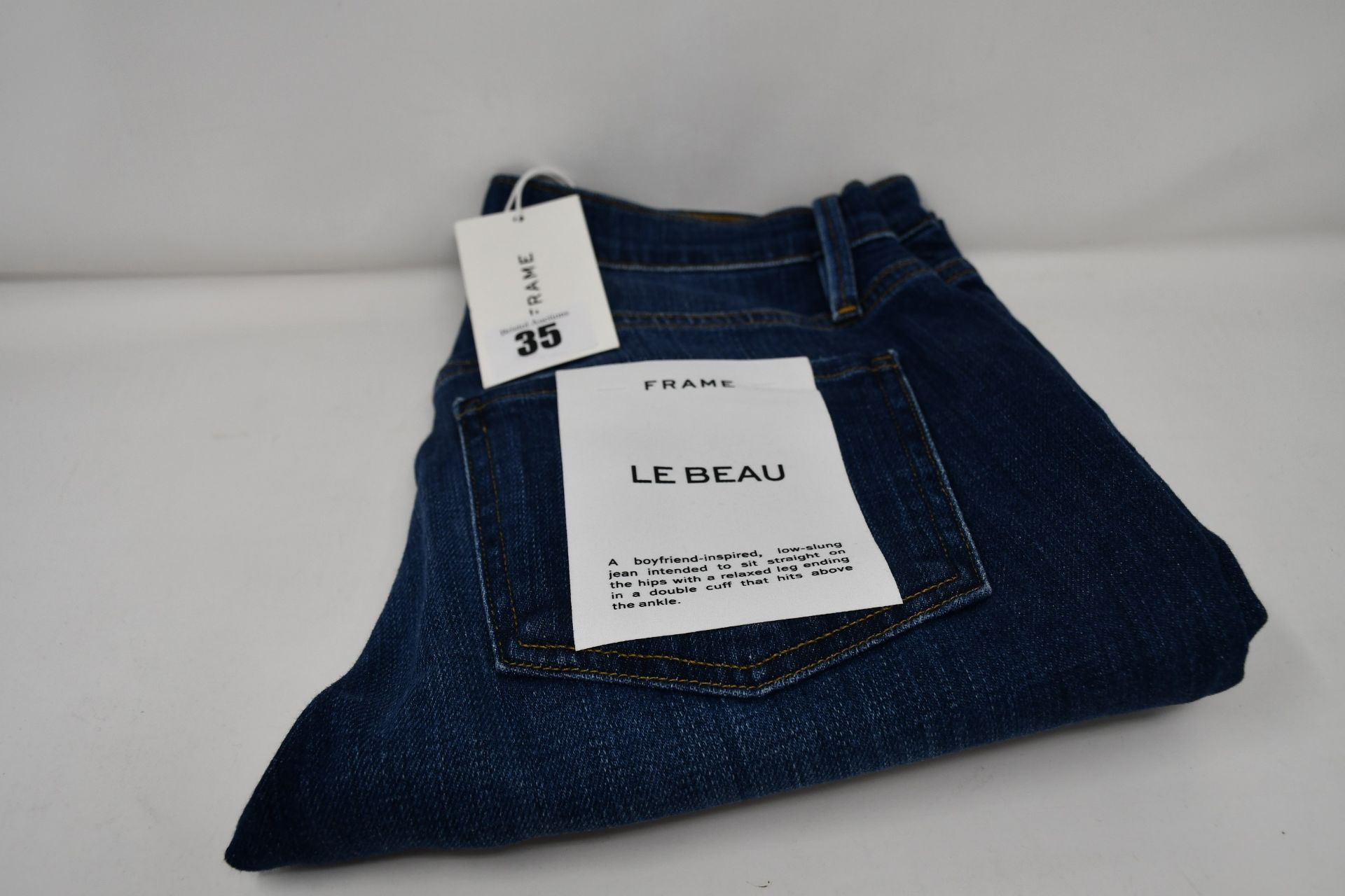 A pair of as new Frame Le Beau jeans in Burnside (Size 24).