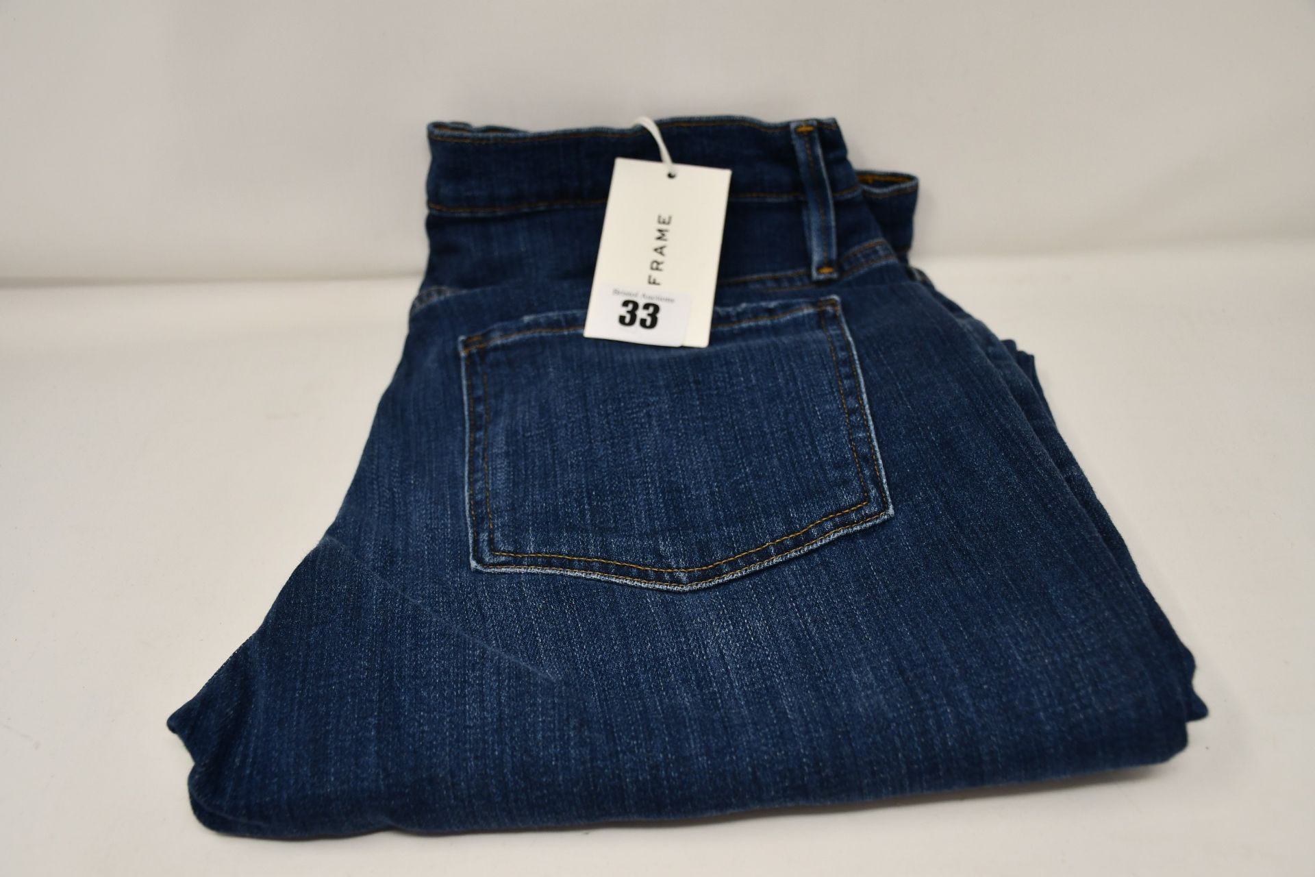 A pair of as new Frame Le Beau jeans in Burnside (Size 28).