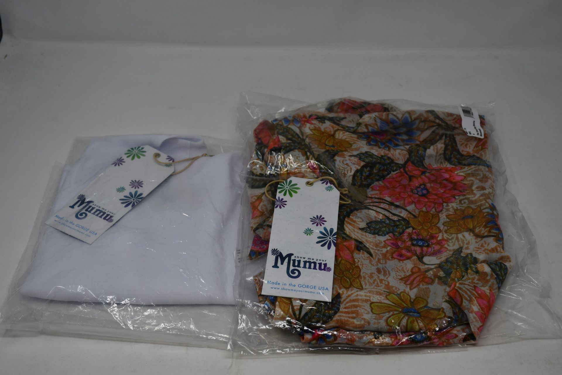 An as new Show Me Your Mumu Clothing; The Great Wrap Bloomtastic shorts (S - RRP $118) and Biley Bow