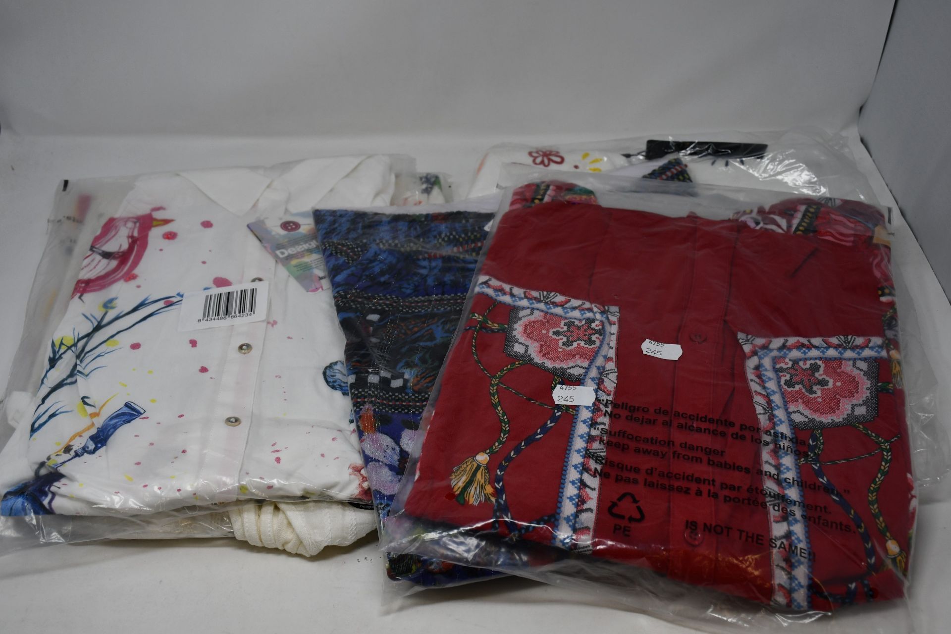 Six items of as new Desigual clothing.