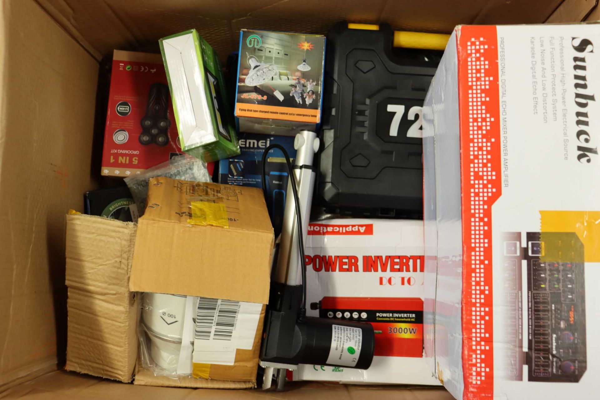 A box of assorted as new small electrical items and accessories.