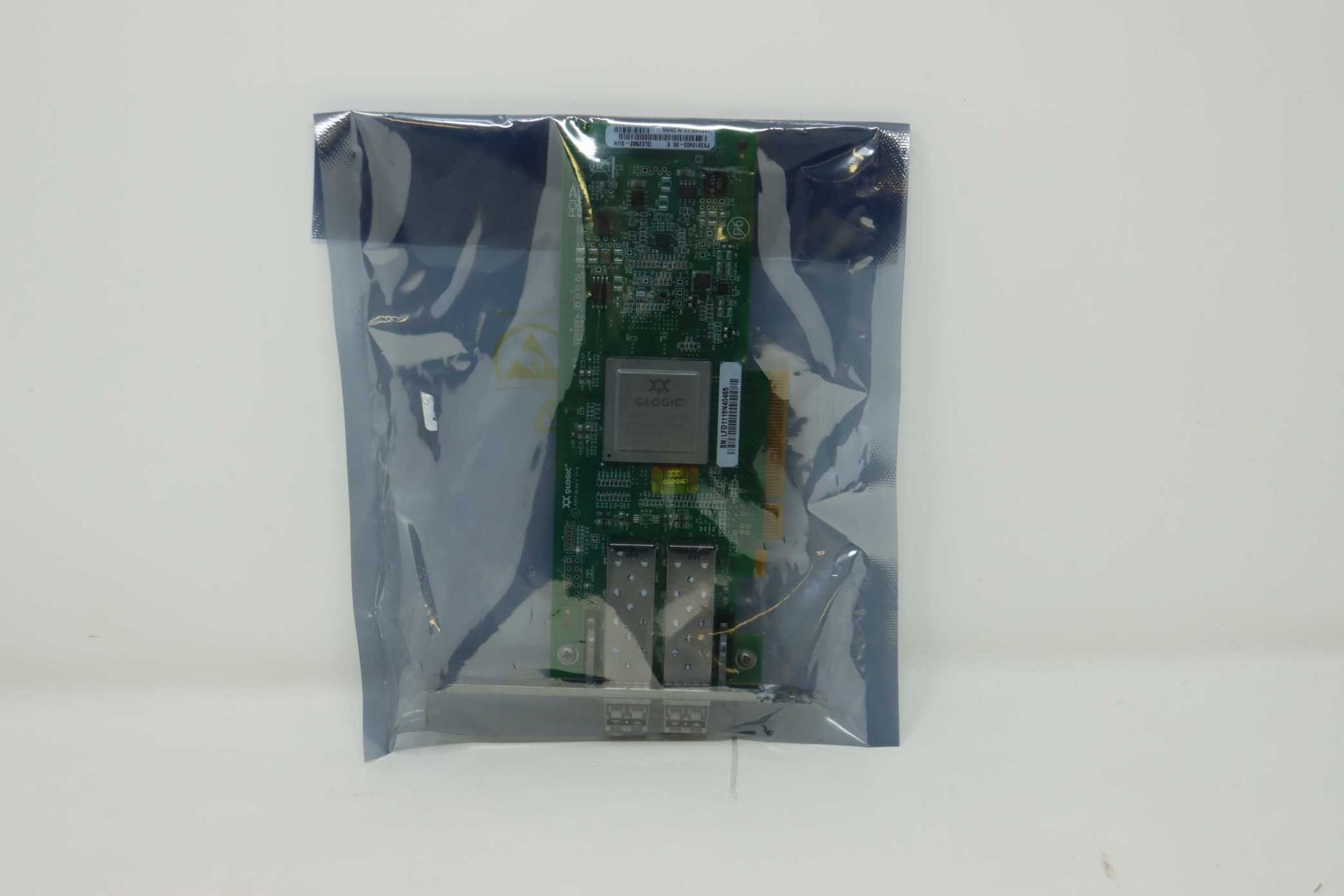 An as new Qlogic QLE2562-SUN Dual Port PCI-E 8GB Fibre Channel Host Bus Adapter (Packaging sealed).