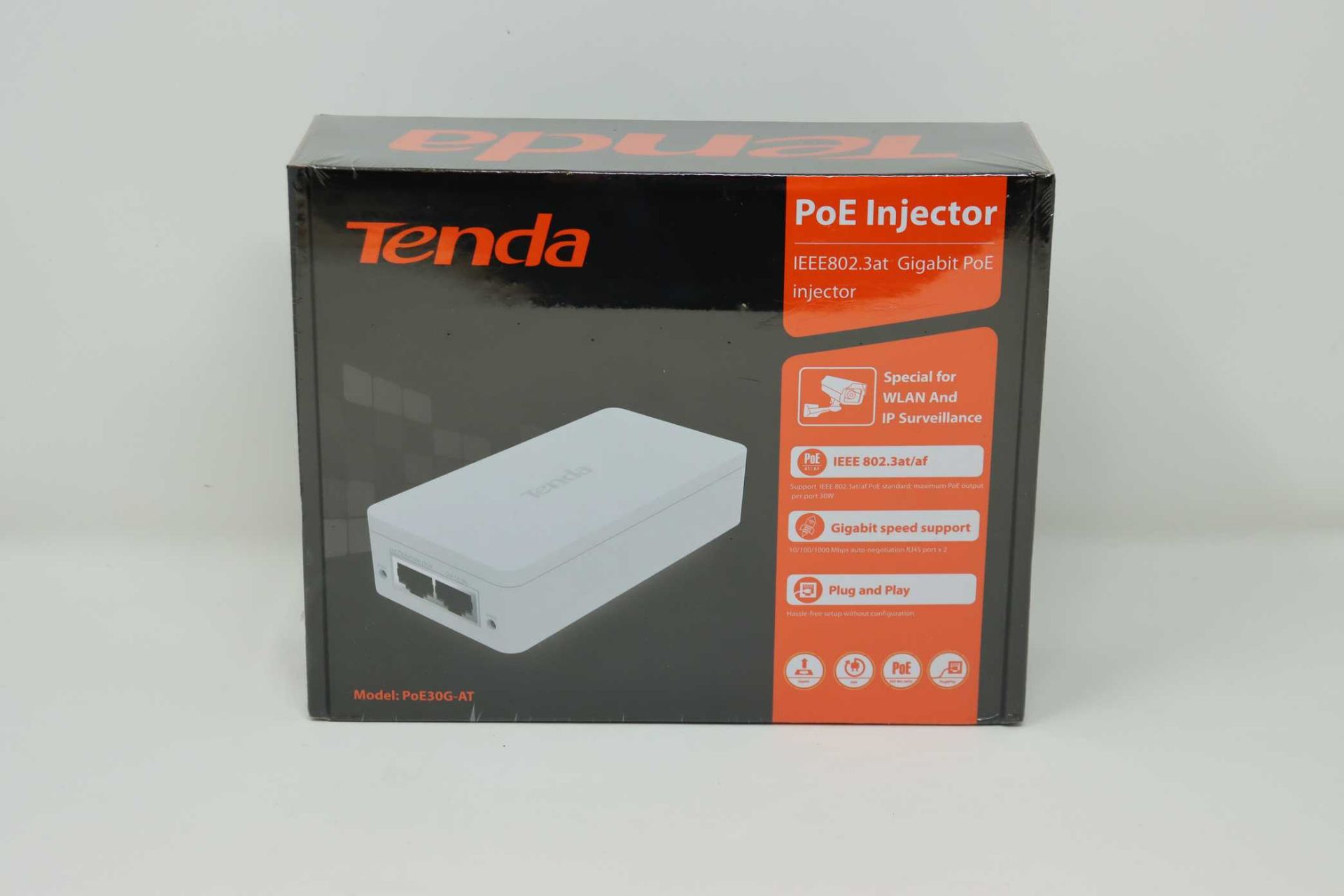 A boxed as new Tenda IEEE802.3at PoE Injector (Model: PoE30G-AT) (Box sealed).
