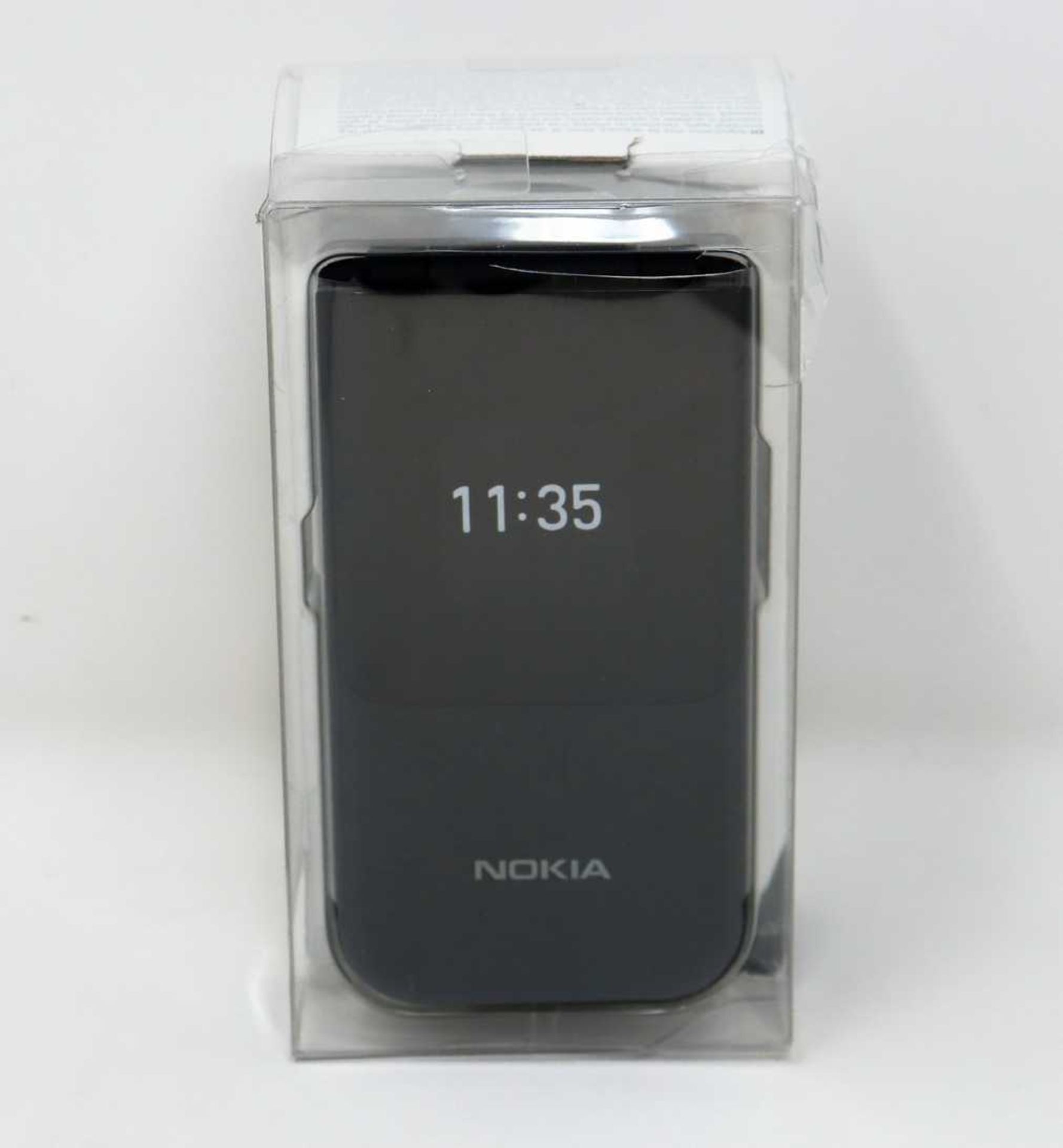 A boxed as new Nokia 2720 Flip TA-1173 SS 4G LTE in Black (Box sealed, some damage to packaging).