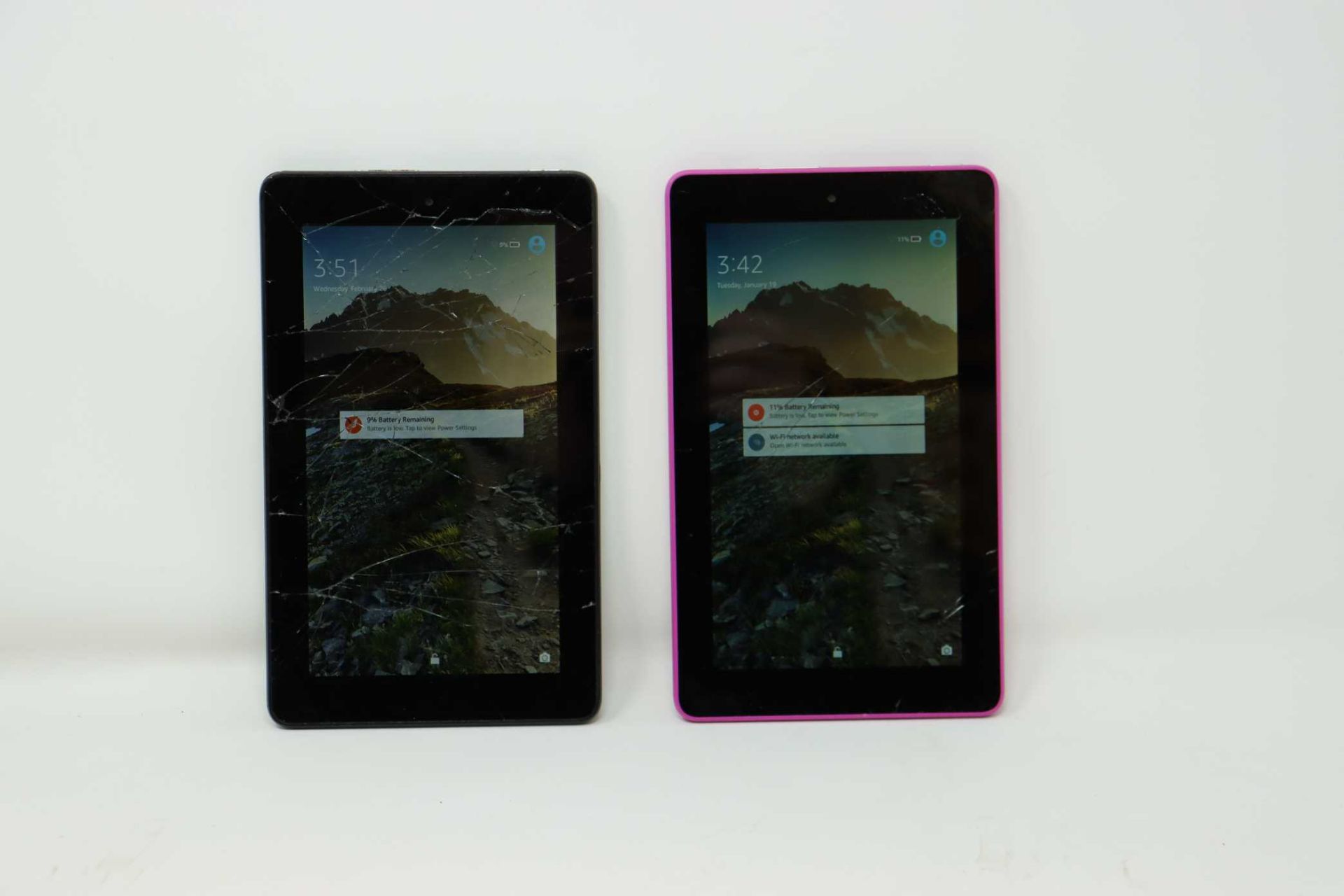 A pre-owned Amazon Fire (5th Gen) 16GB in Purple and a pre-owned Amazon Fire (5th Gen) 16GB in Black