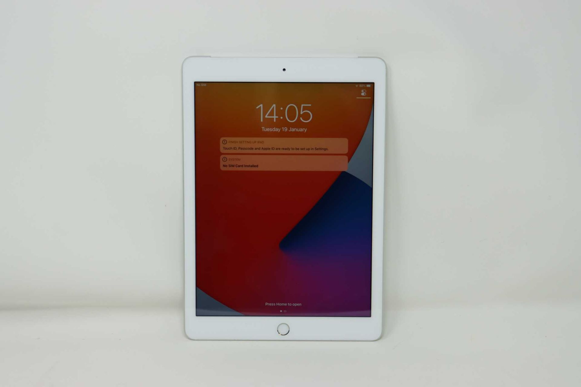 A pre-owned Apple iPad 9.7" 5th Gen (Wi-Fi/Cellular) A1823 128GB in Silver (iCloud activation clear.