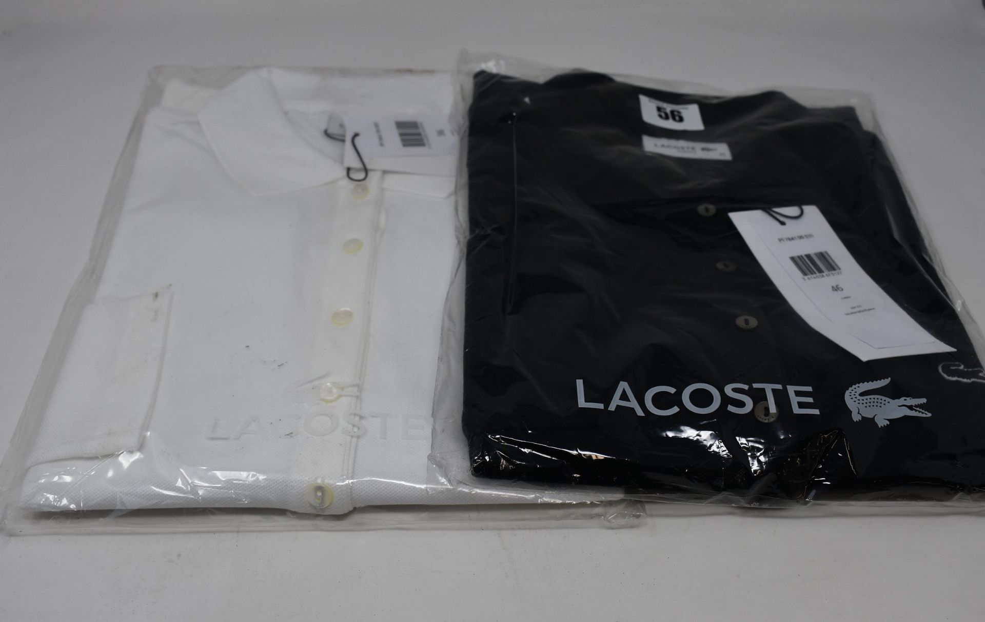 Two as new Lacoste polo shirts; black (Size 46) and white (Size 36).