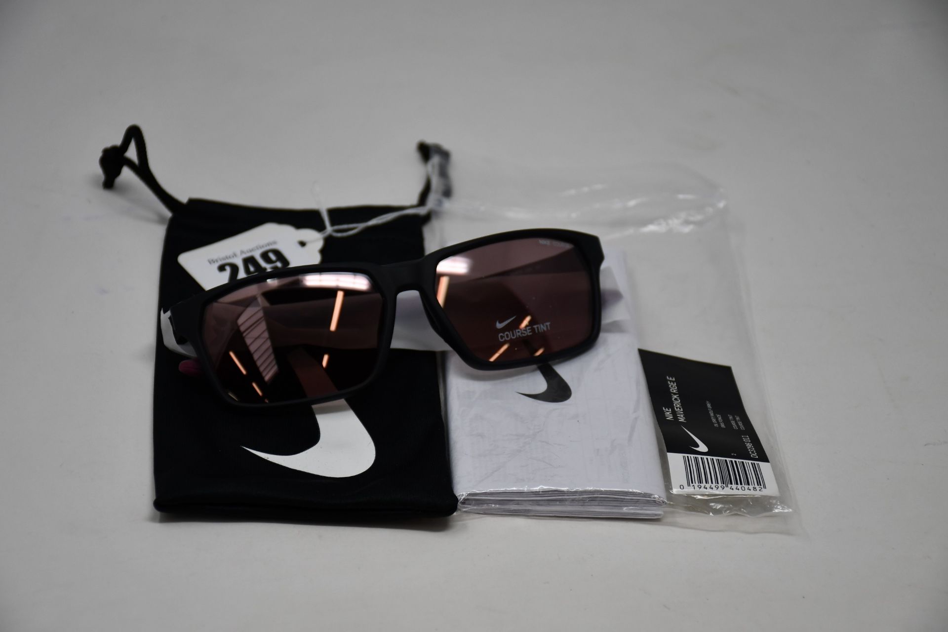A pair of as new Nike Maverick RGE E sunglasses with protective pouch (RRP £137).