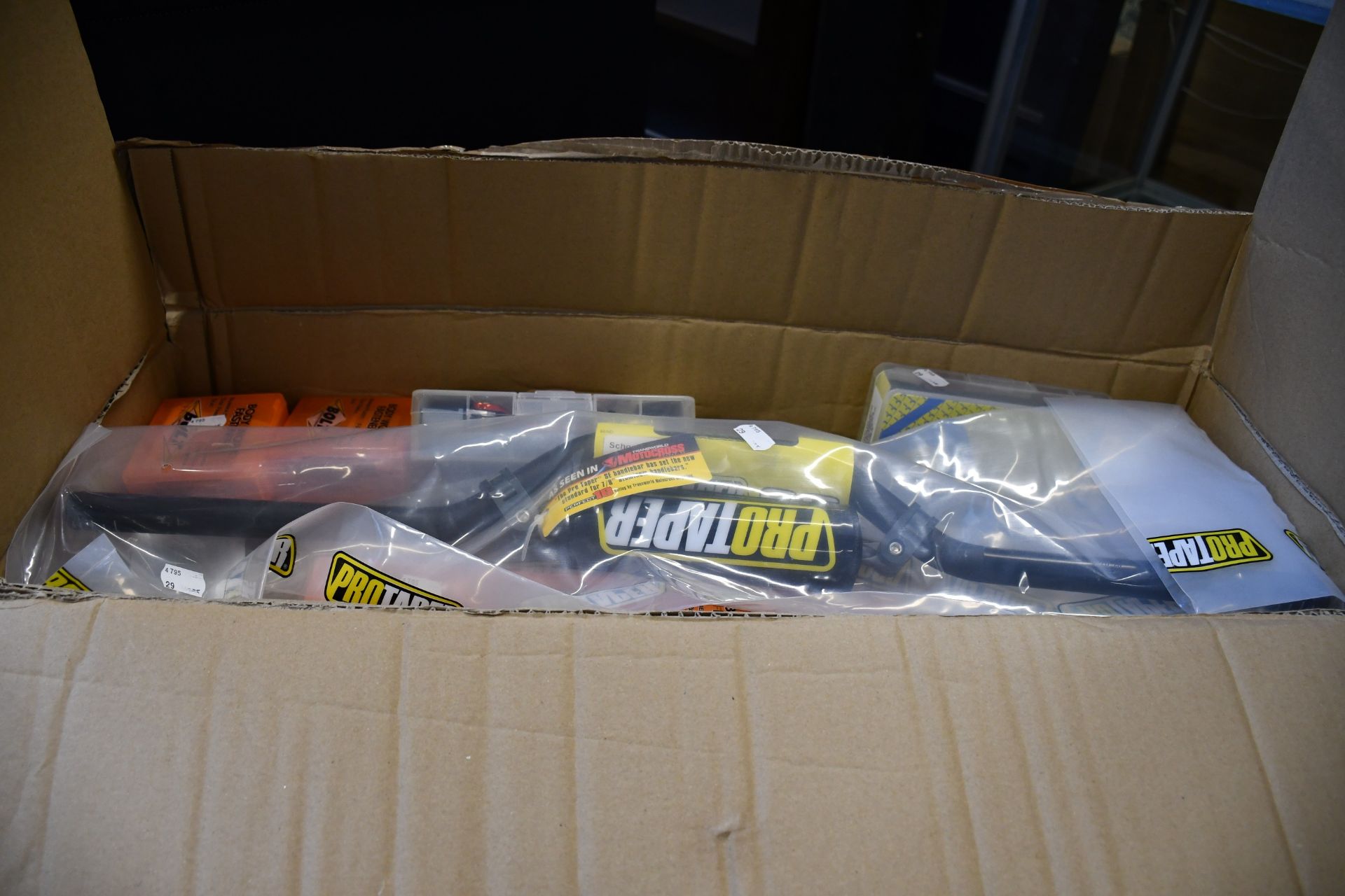 A large quantity of boxed as new motorcycle equipment and related items to include Apico Factory