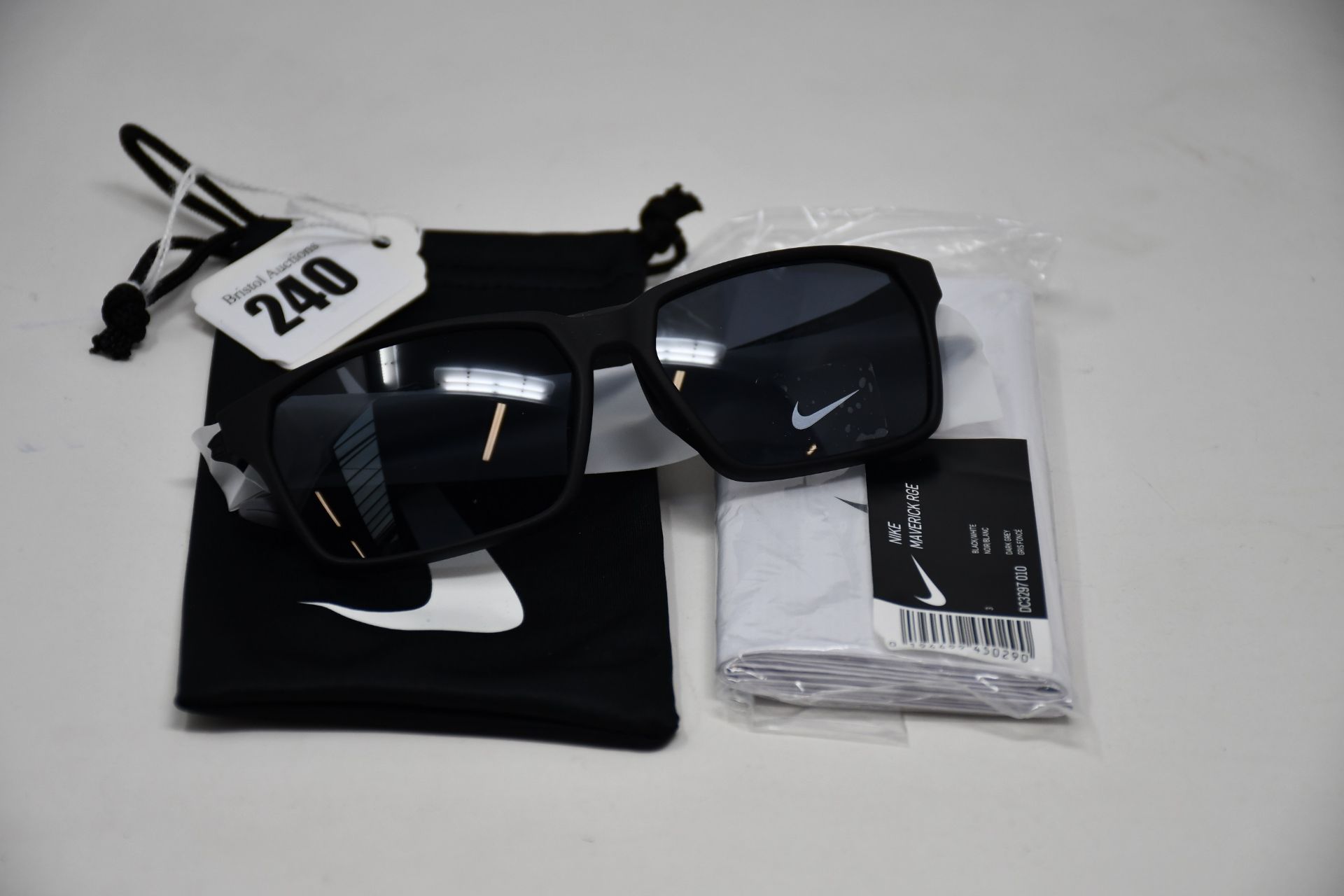 A pair of as new Nike Maverick RGE E sunglasses with protective pouch (RRP £137).