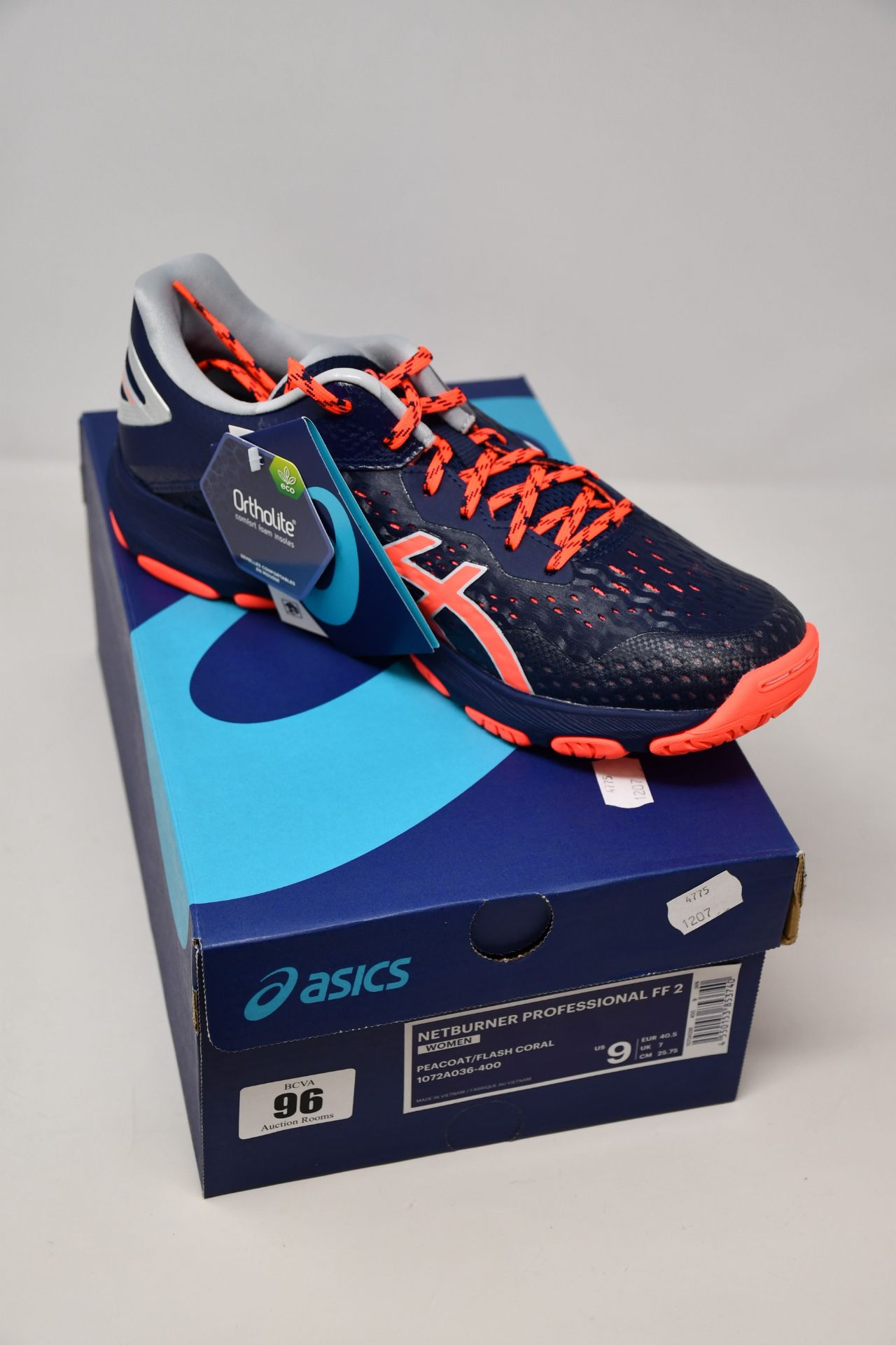 A pair of as new Asics Netburner Super FF 2 trainers (UK 7).