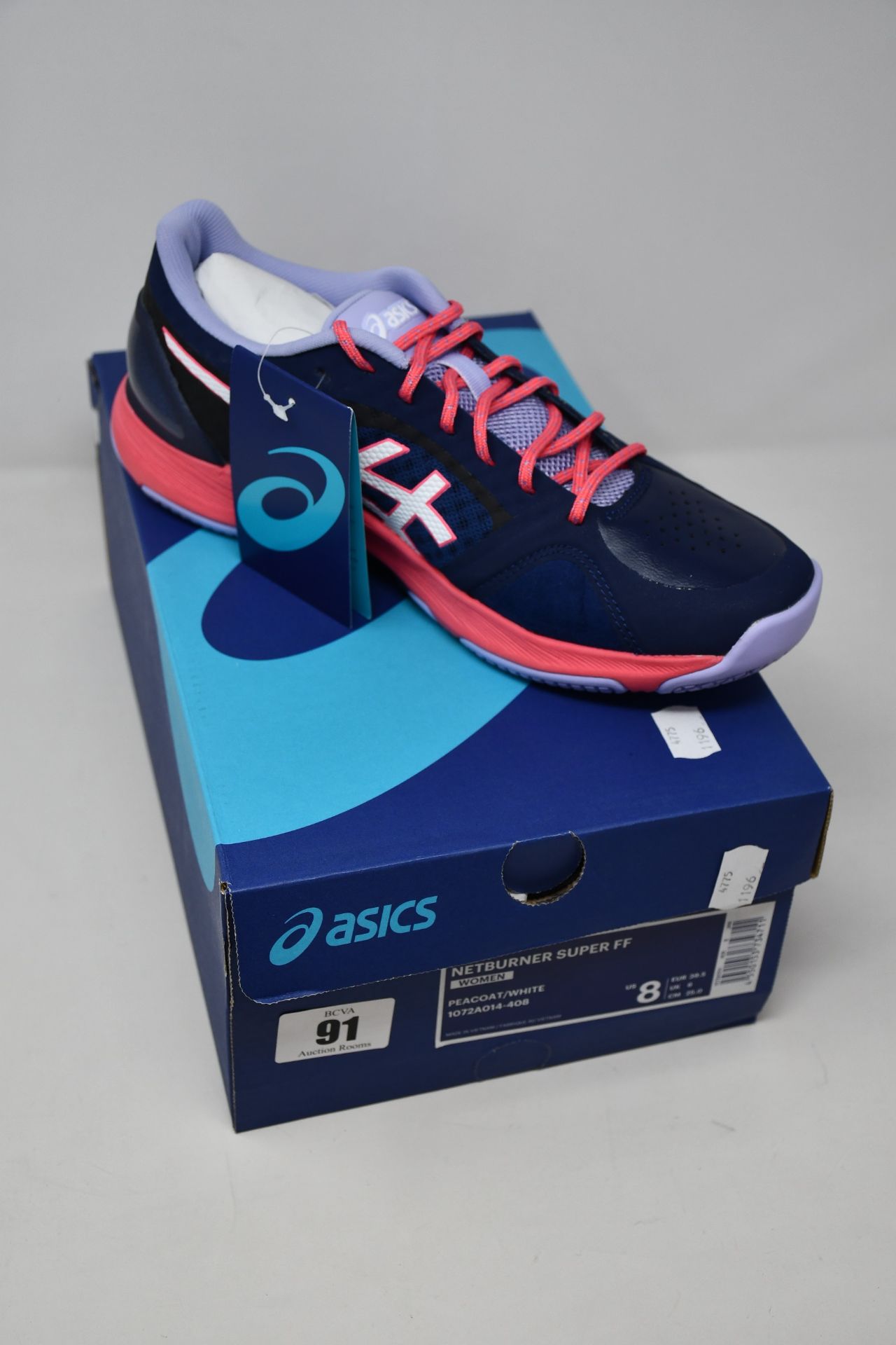 A pair of as new Asics Netburner Super FF trainers (UK 6).