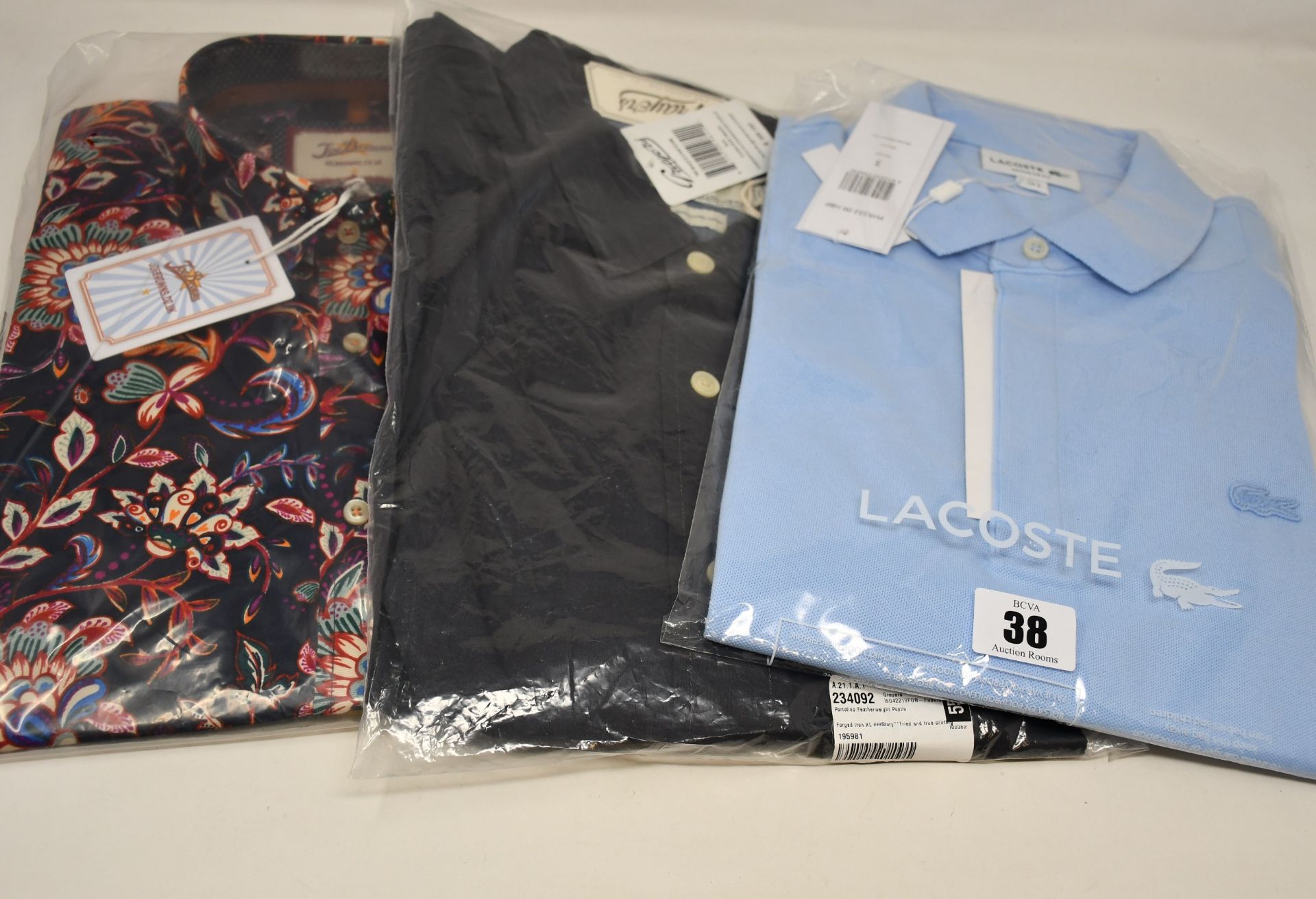 A men's as new Joe Brown shirt (M), Grayers Forged Iron shirt (XL - RRP $98) and a Lacoste polo