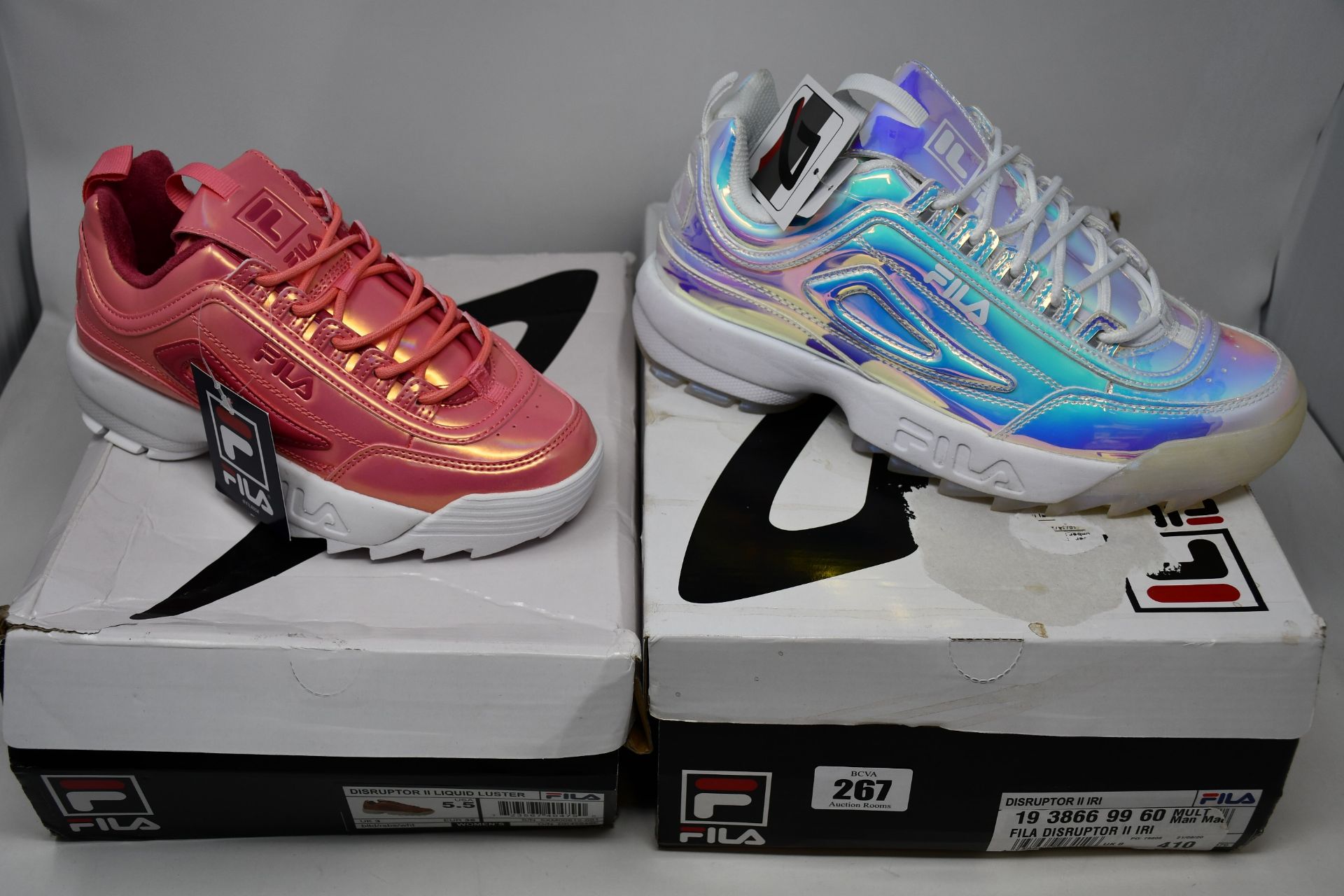 Two pairs of Fila Disruptor II trainers; Liquid Luster (UK 3) and Iridescent (UK 8).