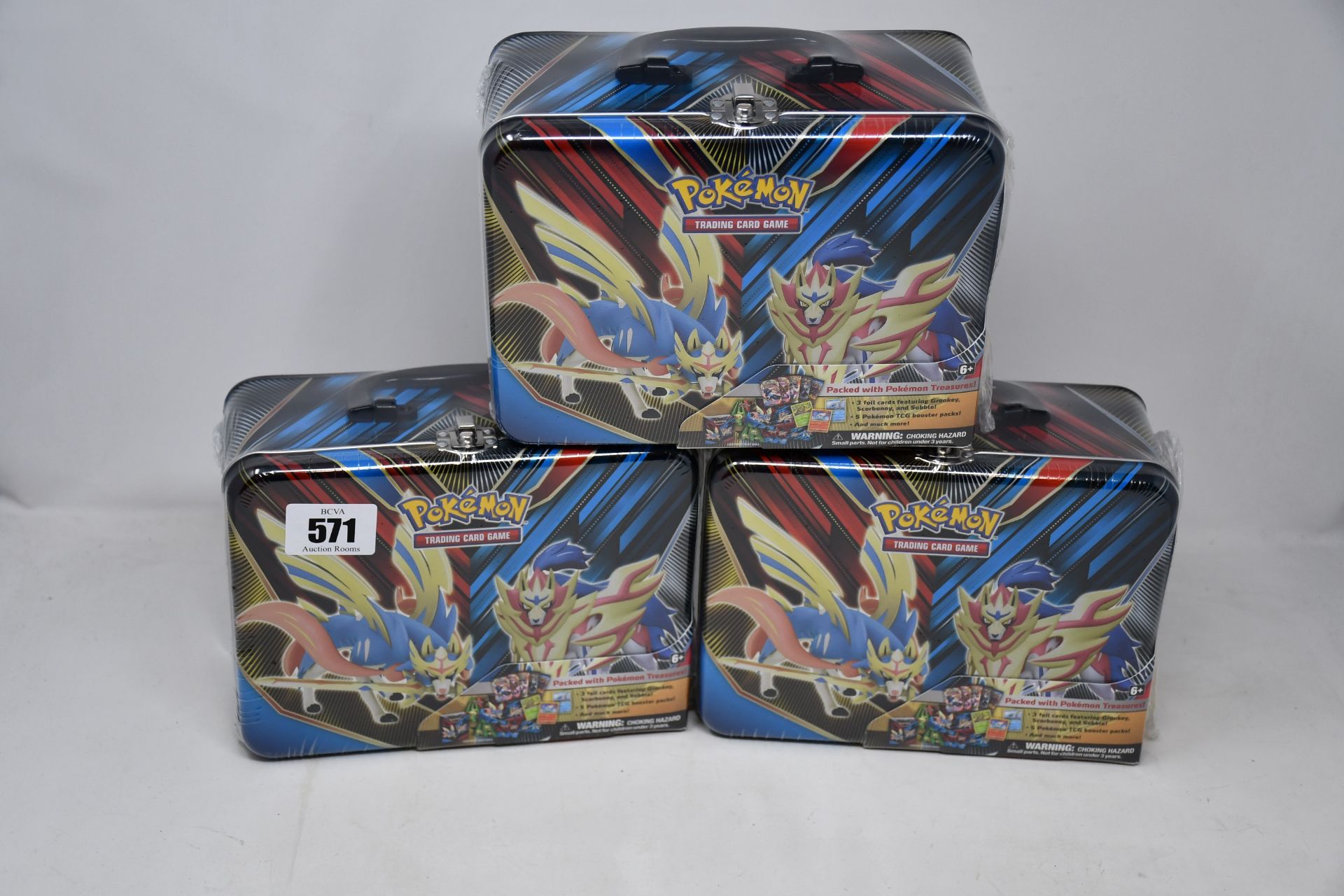 Three boxed as new Pokemon trading cards collectors chests.