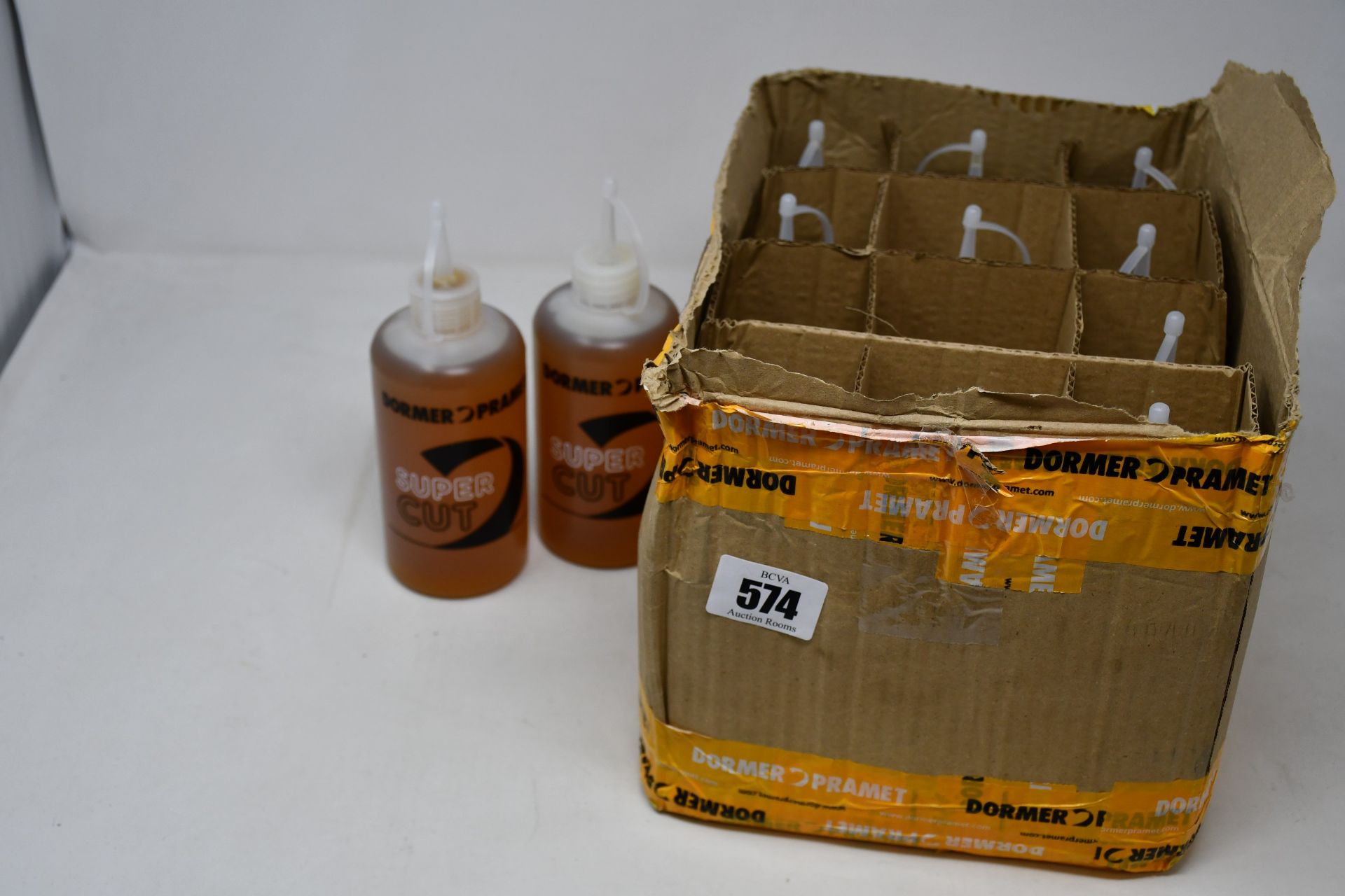 Twelve as new Dormer Cutting Fluid (400g).