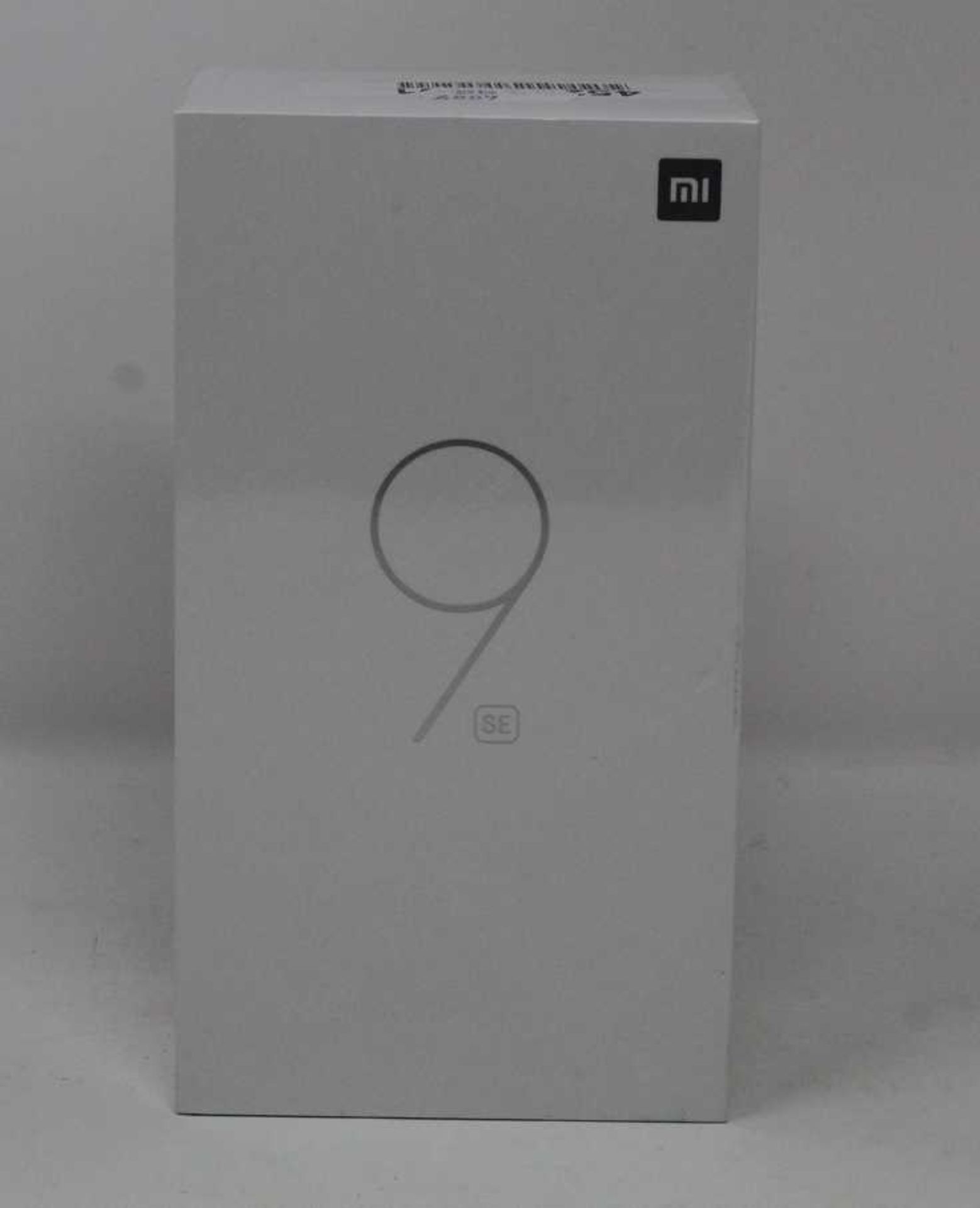 A boxed as new Xiaomi Mi 9 SE Global Version 6GB RAM 64GB Storage Android Smartphone in Piano Black