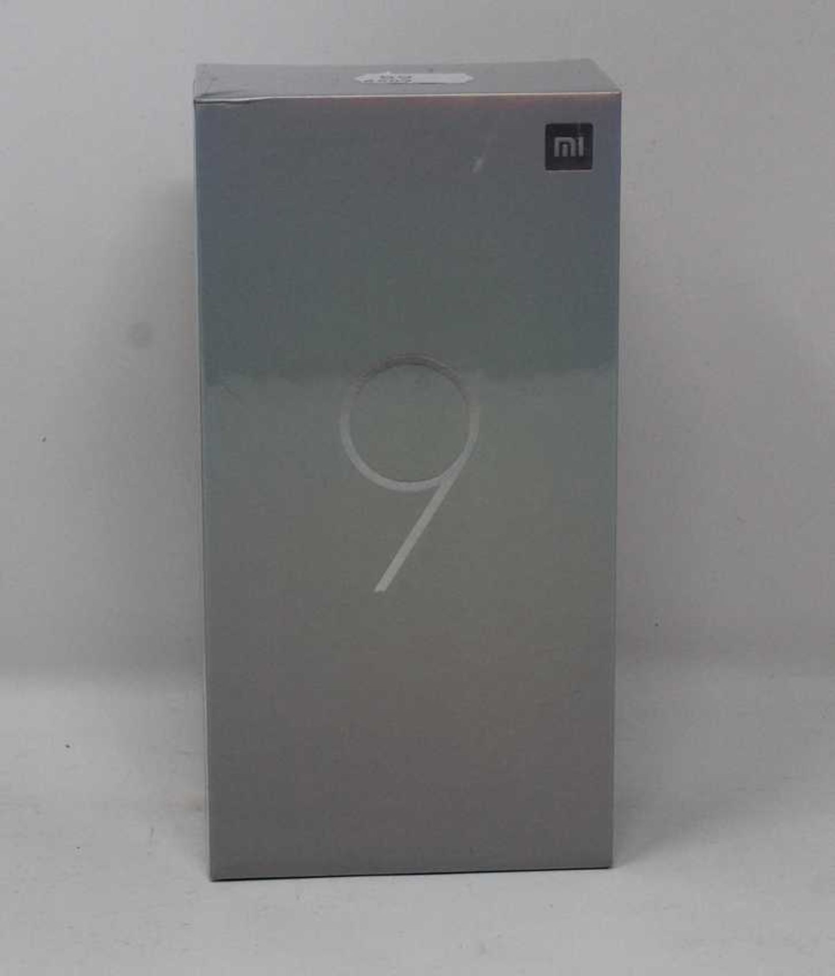 A boxed as new Xiaomi Mi 9 Global Version 6GB RAM 128GB Storage Android Smartphone in Piano Black