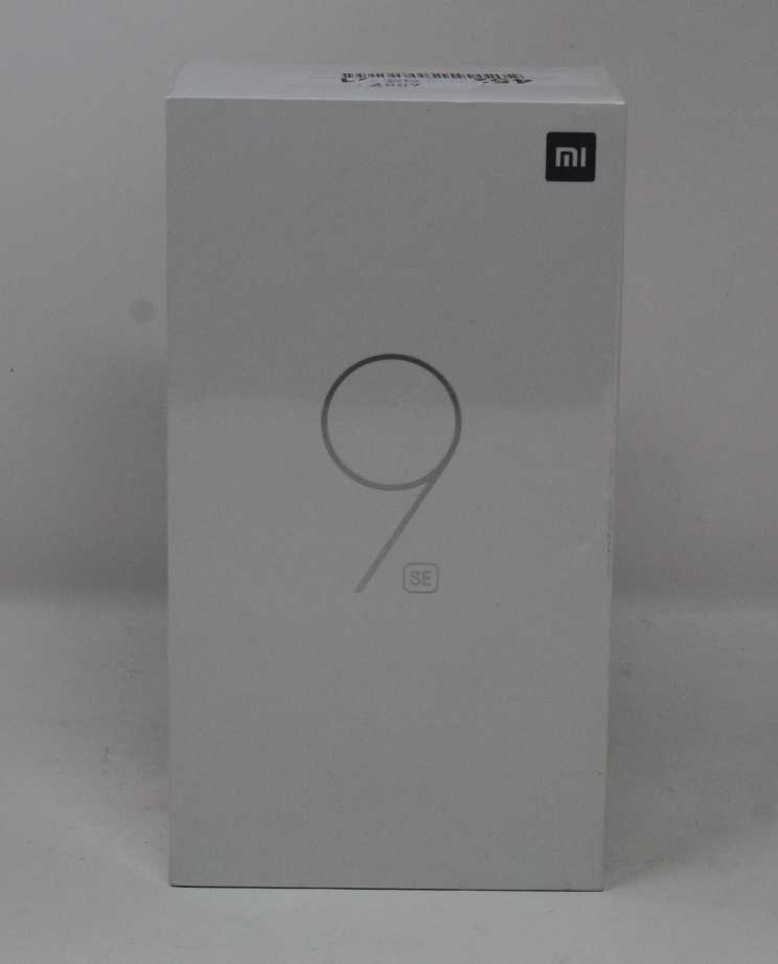 A boxed as new Xiaomi Mi 9 SE Global Version 6GB RAM 64GB Storage Android Smartphone in Piano Black