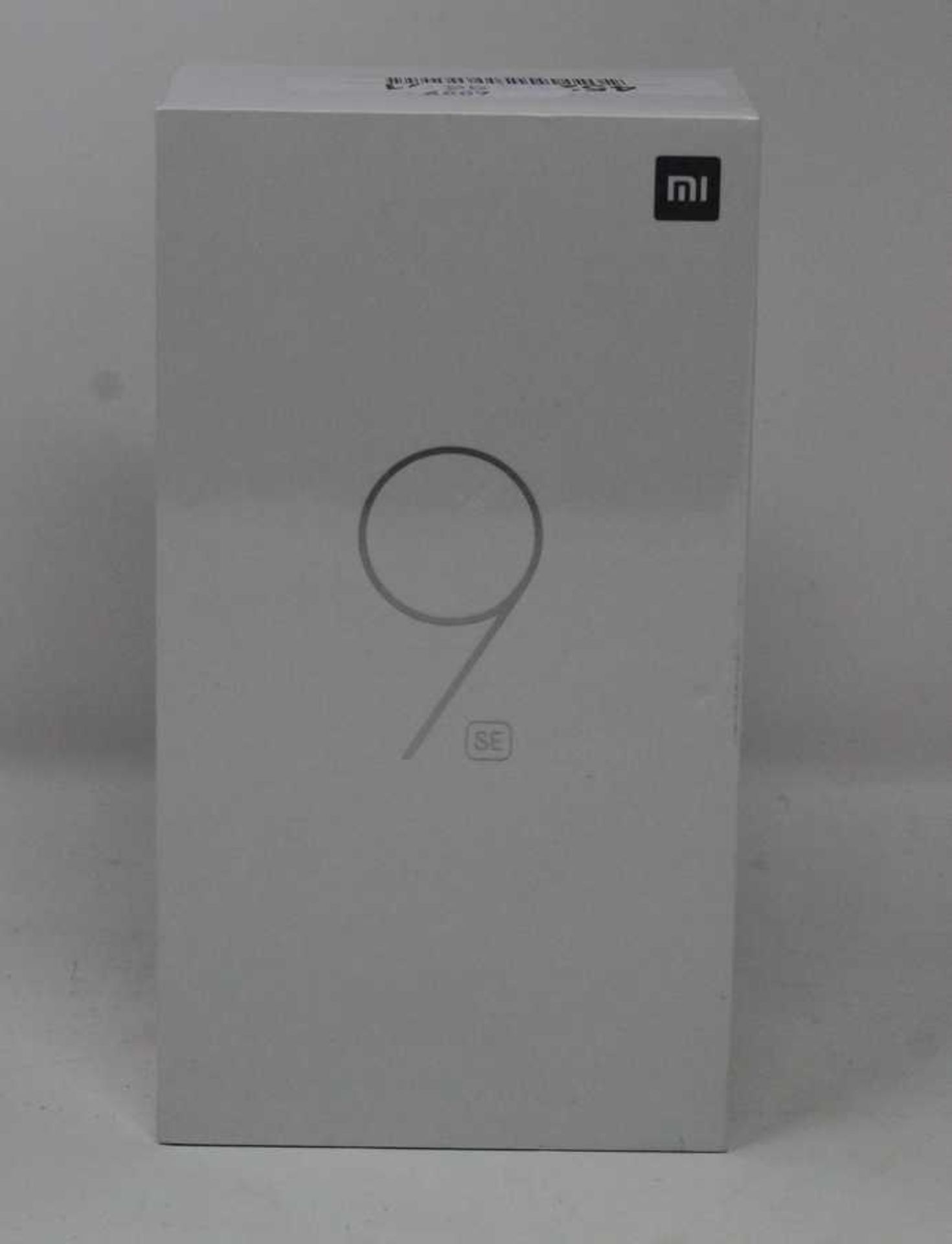 A boxed as new Xiaomi Mi 9 SE Global Version 6GB RAM 64GB Storage Android Smartphone in Piano Black