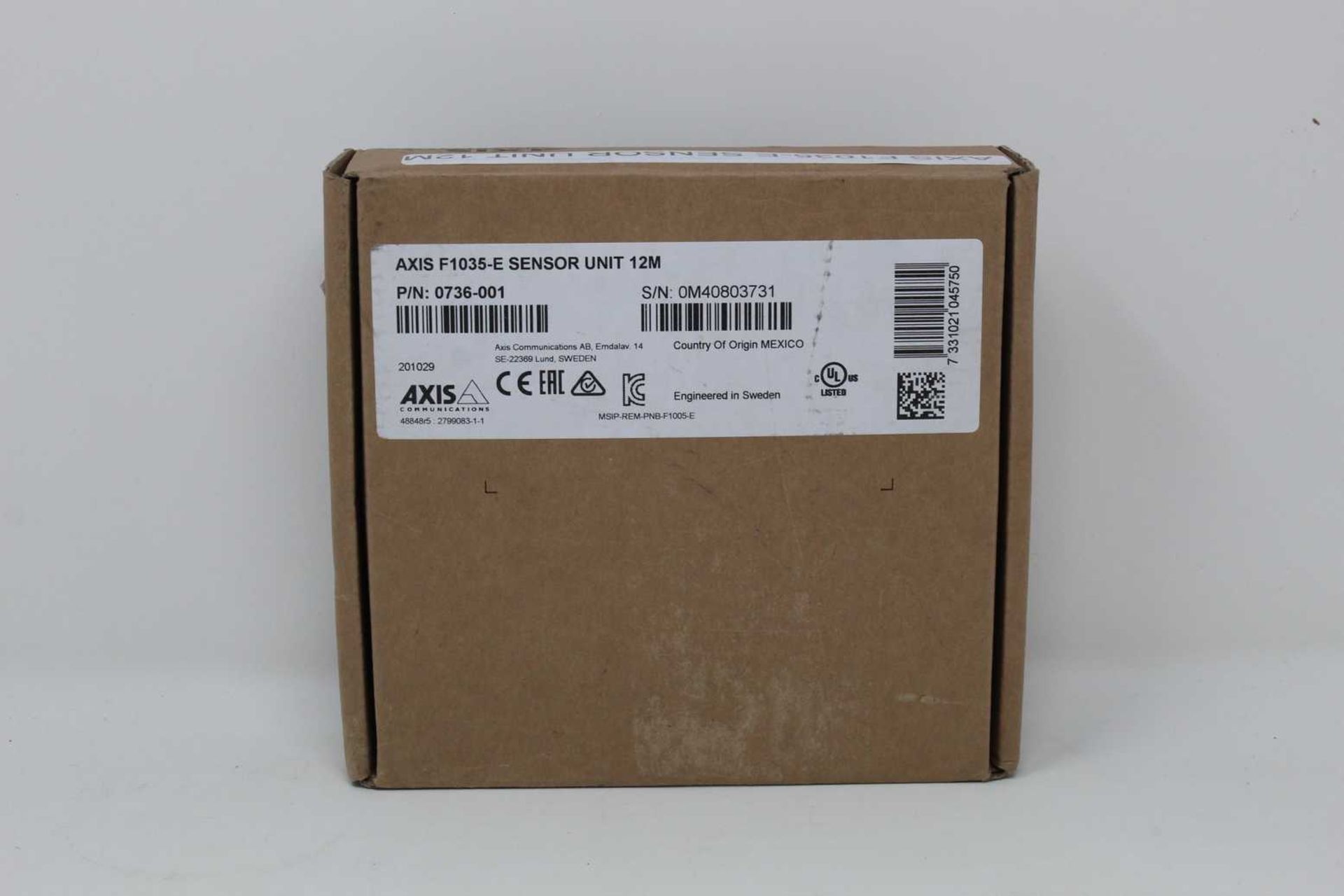 A boxed as new Axis Communications F1035-E Sensor Unit with 12M Cable (P/N: 0736-001) (Box opened).