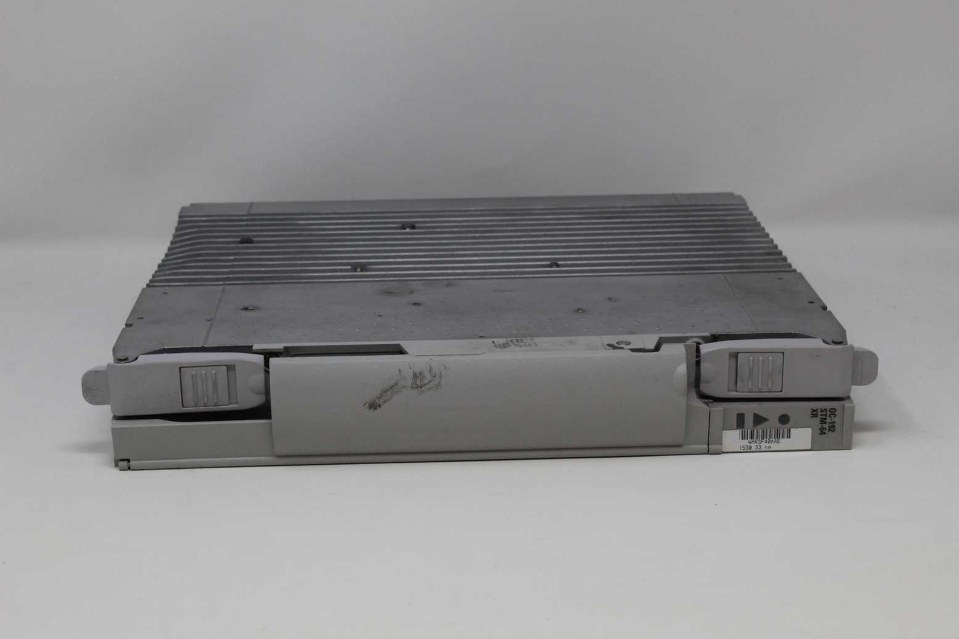 A pre-owned Nortel Optera NTCA04EP WMR3F40AAE OC-192 STM-64 XR (Untested, sold as seen).